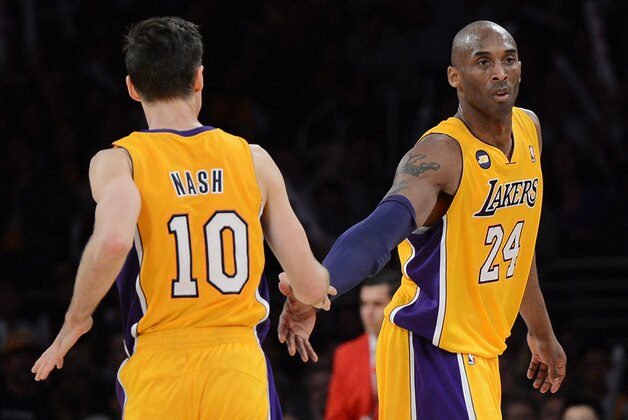 Mar 22, 2013; Los Angeles, CA, USA;  Los Angeles Lakers shooting guard Kobe Bryant (24) and point guard Steve Nash (10) in the second half of the game against the Washington Wizards at the Staples Center. Wizards won 103-100. Mandatory Credit: Jayne Kamin-Oncea-USA TODAY Sports