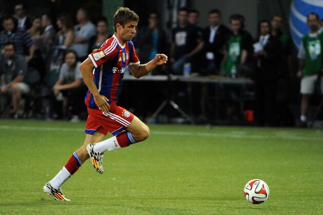 PORTLAND, OR - AUGUST 06: Thomas Muller #25 of Bayern Munich brings the ball up the pitch during the second half of the game against the MLS All-Stars  at Providence Park on August 6, 2014 in Portland, Oregon.  (Photo by Steve Dykes/Getty Images)