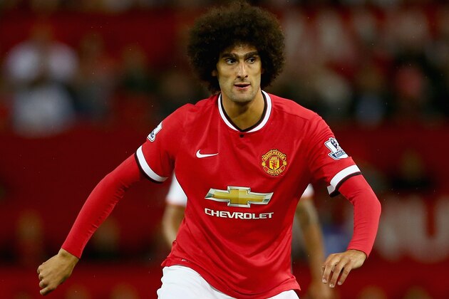 MANCHESTER, ENGLAND - AUGUST 12:  Marouane Fellaini of Manchester United in action during the Pre Season Friendly match between Manchester United and Valencia at Old Trafford on August 12, 2014 in Manchester, England.  (Photo by Clive Brunskill/Getty Images)