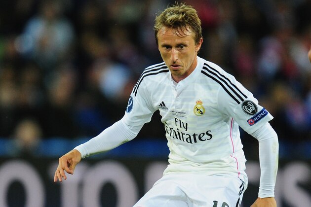 CARDIFF, WALES - AUGUST 12:  Real Madrid player Luka Modric in action during the UEFA Super Cup match between Real Madrid and Sevilla FC  at Cardiff City Stadium on August 12, 2014 in Cardiff, Wales.  (Photo by Stu Forster/Getty Images)