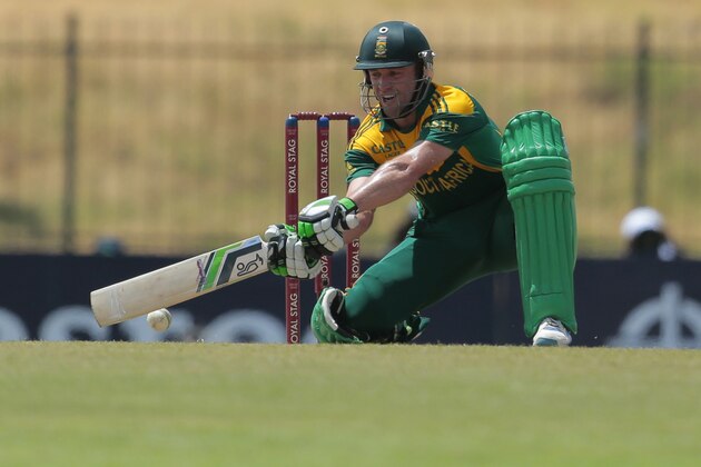 South African batsman AB de Villiers plays a shot during the third one-day international cricket match between Sri Lanka and South Africa in Sooriyawewa, Sri Lanka, Saturday, July 12, 2014. (AP Photo/Eranga Jayawardena)