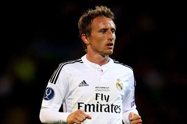 CARDIFF, WALES - AUGUST 12:  Luka Modric of Real Madrid in action during the UEFA Super Cup between Real Madrid and Sevilla FC at Cardiff City Stadium on August 12, 2014 in Cardiff, Wales.  (Photo by Clive Mason/Getty Images)