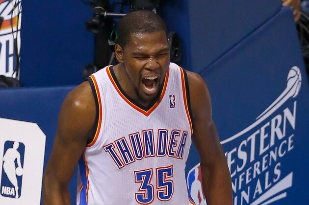 OKLAHOMA CITY, OK - MAY 31:  Kevin Durant #35 of the Oklahoma City Thunder celebrates after a play against the San Antonio Spurs in the first half during Game Six of the Western Conference Finals of the 2014 NBA Playoffs at Chesapeake Energy Arena on May 31, 2014 in Oklahoma City, Oklahoma. NOTE TO USER: User expressly acknowledges and agrees that, by downloading and or using this photograph, User is consenting to the terms and conditions of the Getty Images License Agreement.  (Photo by Tom Pennington/Getty Images)