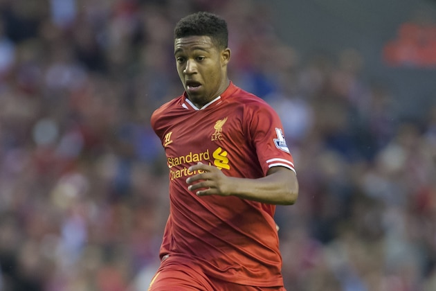 Liverpool's Jordon Ibe takes the ball downfield during his team's English League Cup soccer match against Notts County at Anfield Stadium, Liverpool, England, Tuesday Aug. 27, 2013. (AP Photo/Jon Super)