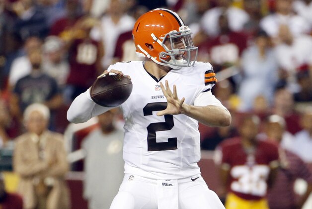 Cleveland Browns quarterback Johnny Manziel (2) looks to pass during the first half of an NFL preseason football game against the Washington Redskins Monday, Aug. 18, 2014, in Landover, Md. (AP Photo/Evan Vucci)