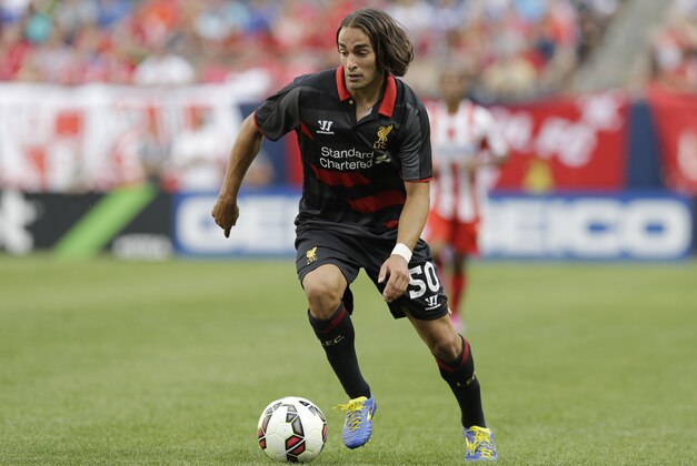 Liverpool FC midfielder Lazar Markovic (50) controls the ball against the Olympiacos during the first half of International Champions Cup soccer match in Chicago, Sunday, July 27, 2014. The Liverpool FC won 1-0. (AP Photo/Nam Y. Huh)