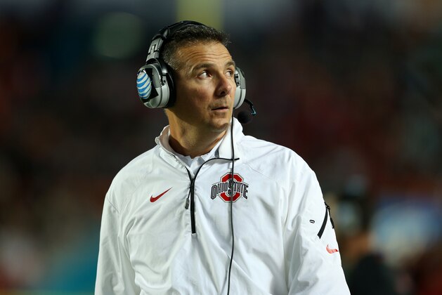 MIAMI GARDENS, FL - JANUARY 03:  Head coach Urban Meyer of the Ohio State Buckeyes looks on from the sideline in the first half against the Clemson Tigers during the Discover Orange Bowl at Sun Life Stadium on January 3, 2014 in Miami Gardens, Florida.  (Photo by Mike Ehrmann/Getty Images)
