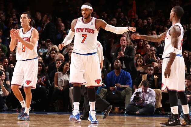 NEW YORK, NY - FEBRUARY 07: Carmelo Anthony #7 of the New York Knicks gets a high-five from teammate J.R. Smith #8 during a game against the Denver Nuggets at Madison Square Garden in New York City on February 07, 2014.  NOTE TO USER: User expressly acknowledges and agrees that, by downloading and or using this photograph, User is consenting to the terms and conditions of the Getty Images License Agreement. Mandatory Copyright Notice: Copyright 2014 NBAE  (Photo by Nathaniel S. Butler/NBAE via Getty Images)