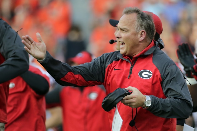 Georgia head coach Mark Richt yells instructions to his team during the first half of an NCAA college football game against Auburn in Auburn, Ala., Saturday, Nov. 16, 2013. (AP Photo/Dave Martin)