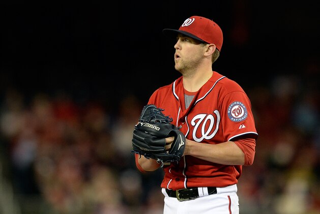 WASHINGTON, DC - MAY 25:  Drew Storen #22 of the Washington Nationals reacts in the eighth inning during a game against the Philadelphia Phillies at Nationals Park on May 25, 2013 in Washington, DC.  (Photo by Patrick McDermott/Getty Images)