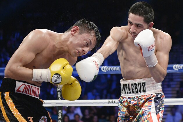 LAS VEGAS-NV-MARCH 8: Leo Santa Cruz (R) throws a punch against Cristian Mijares during the WBC super bantamweight title bout at the MGM Grand Garden March 8, 2014, in Las Vegas, Nevada. (Photo by Kevork Djansezian/Getty Images)