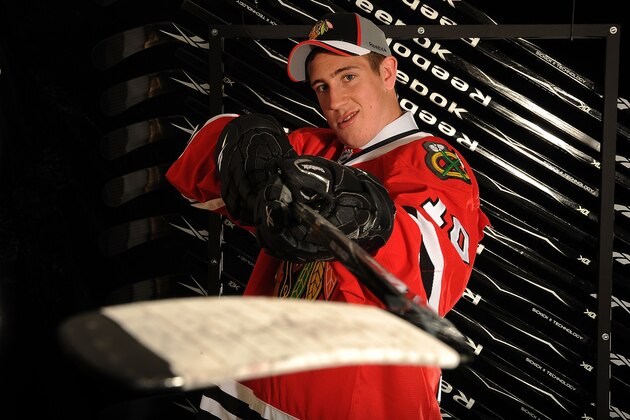 LOS ANGELES, CA - JUNE 25:  Kevin Hayes, drafted 24th overall by the Chicago Blackhawks, poses on stage during the 2010 NHL Entry Draft at Staples Center on June 25, 2010 in Los Angeles, California.  (Photo by Noah Graham/NHLI via Getty Images)