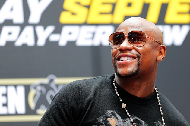 NEW YORK, NY - JULY 14:  Floyd Mayweather Jr. ilooks on during a news conference at the Pedestrian Walk in Times Square on July 14, 2014 in New York City. Floyd Mayweather Jr. and Marcos Maidana are scheduled to fight September 13, 2014 at the MGM Grand in Las Vegas.  (Photo by Mike Stobe/Getty Images)