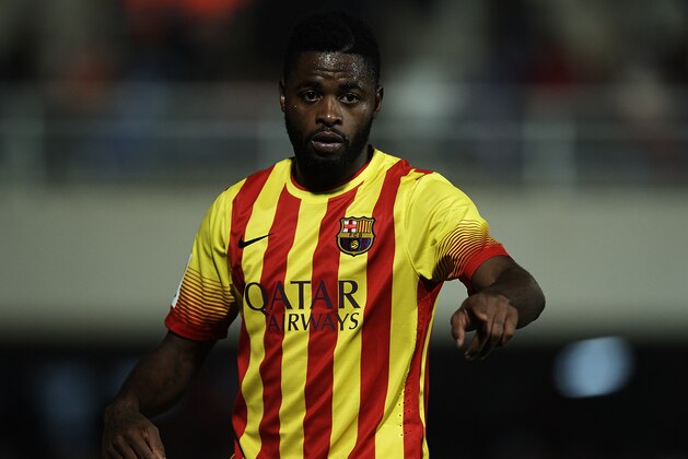 CARTAGENA, SPAIN - DECEMBER 06:  Alex Song of Barcelona reacts during the Copa del Rey, Round of 32 match between FC Cartagena and FC Barcelona at Estadio Cartagonova on December 06, 2013 in Cartagena, Spain.  (Photo by Manuel Queimadelos Alonso/Getty Images)