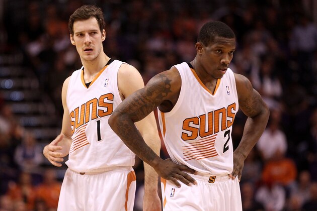 PHOENIX, AZ - DECEMBER 18:  Goran Dragic #1 and Eric Bledsoe #2 of the Phoenix Suns await a free throw shot during the NBA game against the San Antonio Spurs at US Airways Center on December 18, 2013 in Phoenix, Arizona. The Spurs defeated the 108-101.  NOTE TO USER: User expressly acknowledges and agrees that, by downloading and or using this photograph, User is consenting to the terms and conditions of the Getty Images License Agreement.  (Photo by Christian Petersen/Getty Images)