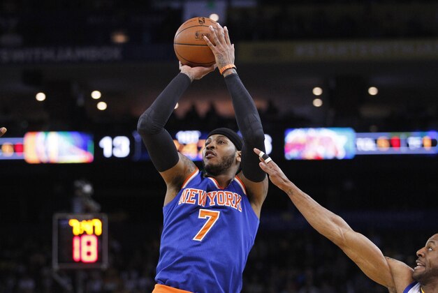Mar 30, 2014; Oakland, CA, USA; New York Knicks forward Carmelo Anthony (7) shoots the ball against the Golden State Warriors in the first quarter at Oracle Arena. The Knicks won 89-84. Mandatory Credit: Cary Edmondson-USA TODAY Sports