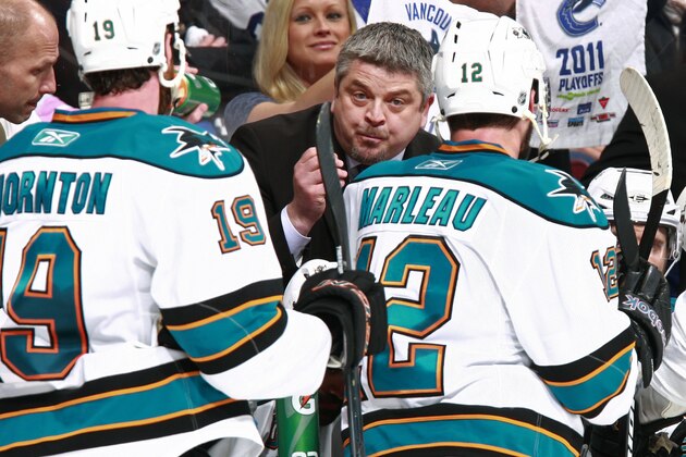 VANCOUVER, CANADA - MAY 24:  Head coach Todd McLellan of the San Jose Sharks talks to Joe Thornton #19 and Patrick Marleau #12 in Game Five of the Western Conference Finals during the 2011 NHL Stanley Cup Playoffs against the Vancouver Canucks at Rogers Arena on May 24, 2011 in Vancouver, British Columbia, Canada. The Vancouver won 3-2.  (Photo by Jeff Vinnick/NHLI via Getty Images)