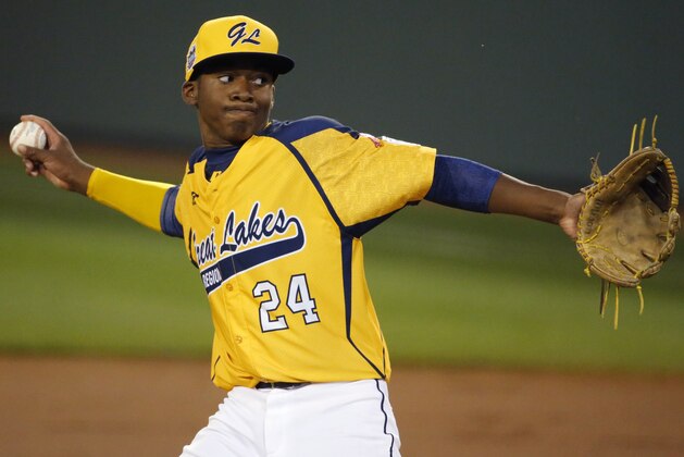 Chicago's Trey Hondras (24) delivers during the first inning against Cumberland  an elimination baseball game at the Little League World Series tournament in South Williamsport, Pa., Monday, Aug. 18, 2014. (AP Photo/Gene J. Puskar)