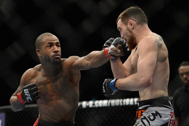 December 14, 2013; Sacramento, CA, USA; Bobby Green (red gloves) fights Pay Healy (blue gloves) during the lightweight bout of the UFC on FOX 9 at Sleep Train Arena. Mandatory Credit: Kyle Terada-USA TODAY Sports