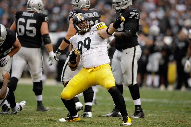 OAKLAND, CA - OCTOBER 27:  Brett Keisel #99 of the Pittsburgh Steelers reacts after making a tackle against the Oakland Raiders at O.co Coliseum on October 27, 2013 in Oakland, California.  (Photo by Ezra Shaw/Getty Images)