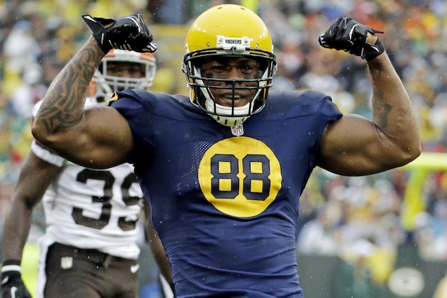 FILE - In this Oct. 20, 2013, file photo, Green Bay Packers' Jermichael Finley reacts after catching a pass during the first half of an NFL football game against the Cleveland Browns, in Green Bay, Wis. Finley has tweeted that he left the intensive care unit and had full feeling in his arms and legs after injuring his neck in a game. Finley posted Monday night, Oct. 21, 2013, on Twitter that he was able to walk to and from the shower. He thanked family, friends, teammates and fans for an outpouring of support. (AP Photo/Morry Gash, File)