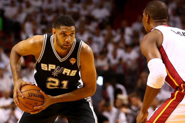 MIAMI, FL - JUNE 10:  Tim Duncan #21 of the San Antonio Spurs looks to pass against the Miami Heat during Game Three of the 2014 NBA Finals at American Airlines Arena on June 10, 2014 in Miami, Florida. NOTE TO USER: User expressly acknowledges and agrees that, by downloading and or using this photograph, User is consenting to the terms and conditions of the Getty Images License Agreement.  (Photo by Andy Lyons/Getty Images)