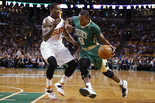 Boston Celtics guard Rajon Rondo (9) drives on Phoenix Suns' Eric Bledsoe during the first quarter of an NBA basketball game in Boston on Friday, March 14, 2014. (AP Photo/Winslow Townson) Boston Celtics guard Rajon Rondo (9) drives on Phoenix Suns' Eric Bledsoe during the first quarter of an NBA basketball game in Boston on Friday, March 14, 2014. (AP Photo/Winslow Townson)