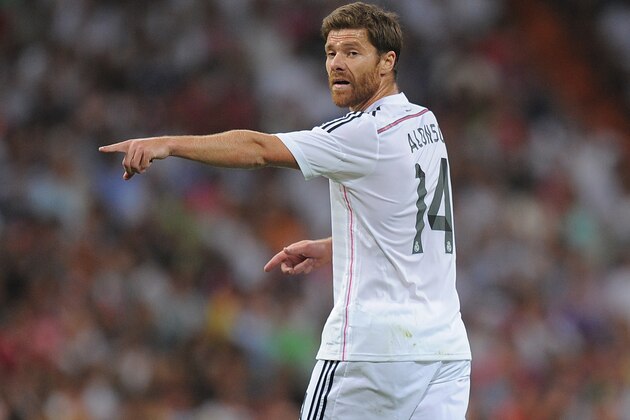 MADRID, SPAIN - AUGUST 19:  Xabi Alonso of Real Madrid reacts during the Supercopa first leg match between Real Madrid and Club Atletico de Madrid     at Estadio Santiago Bernabeu on August 19, 2014 in Madrid, Spain.  (Photo by Denis Doyle/Getty Images)