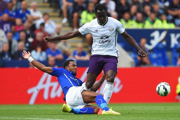 LEICESTER, ENGLAND - AUGUST 16: Romelu Lukaku of Everton is tackled by Liam Moore of Leicester City during the Barclays Premier League match between Leicester City and Everton at the King Power Stadium on August 16, 2014 in Leicester, England.  (Photo by Michael Regan/Getty Images)