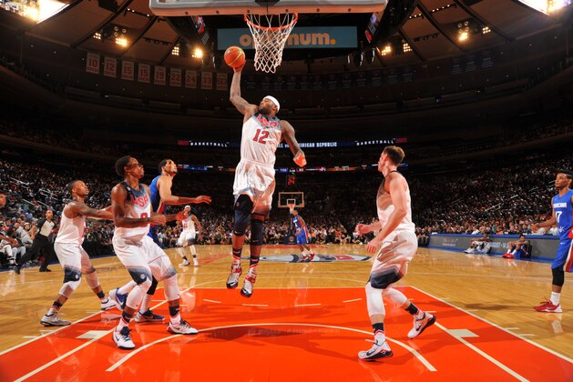 NEW YORK, NY - AUGUST 20: DeMarcus Cousins #12 of the USA Basketball Men's National Team rebounds against the Dominican Republic National Team on August 20, 2014 at Madison Square Garden in New York City.  NOTE TO USER: User expressly acknowledges and agrees that, by downloading and/or using this Photograph, user is consenting to the terms and conditions of the Getty Images License Agreement. Mandatory Copyright Notice: Copyright 2014 NBAE (Photo by Jesse D. GarrabrantNBAE via Getty Images)