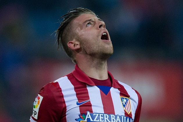 MADRID, SPAIN - DECEMBER 18: Toby Alderweireld of Atletico de Madrid celebrates scoring their second goal during the Copa del Rey Round of 32 second leg match between Club Atletico de Madrid and Sant Andreu at Vivente Calderon Stadium on December 18, 2013 in Madrid, Spain.  (Photo by Gonzalo Arroyo Moreno/Getty Images)