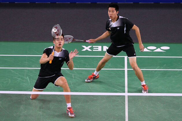 GLASGOW, SCOTLAND - AUGUST 03:  Mas Wei Shem and Wee Kiong Tan of Malaysia compete in the Men's Doubles Gold Medal Match against Chayut Triyachart and Danny Chrisnanta of Singapore at Emirates Arena during day eleven of the Glasgow 2014 Commonwealth Games on August 3, 2014 in Glasgow, United Kingdom.  (Photo by Alex Livesey/Getty Images)