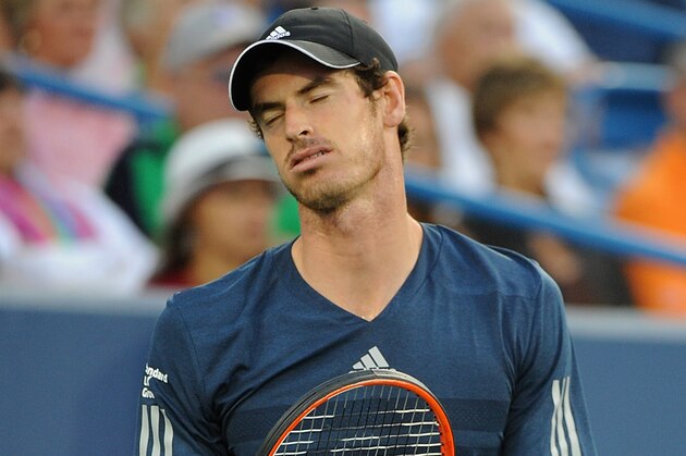 CINCINNATI, OH - AUGUST 15:  Andy Murray of Great Britian reacts during a match against Roger Federer of Switzerland on day 7 of the Western & Southern Open at the Linder Family Center on August 15, 2014 in Cincinnati, Ohio.  (Photo by Jonathan Moore/Getty Images)