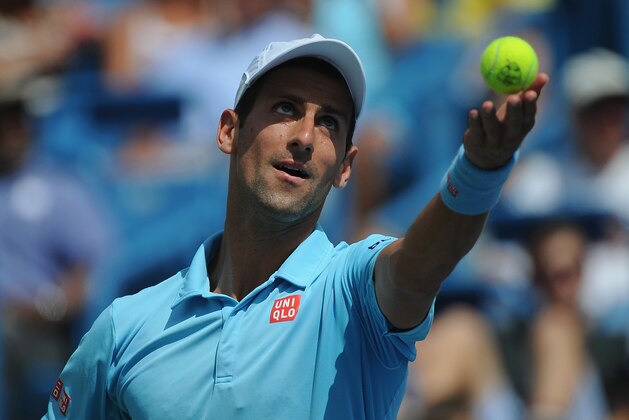 CINCINNATI, OH - AUGUST 14:  Novak Djokovic of Serbia serves against Tommy Robredo of Spain during a match on day 6 of the Western & Southern Open at the Linder Family Tennis Center on August 14, 2014 in Cincinnati, Ohio.  (Photo by Jonathan Moore/Getty Images)