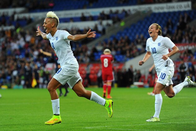 CARDIFF, WALES - AUGUST 21:  England forward Lianne Sanderson (l) celebrates after scoring the fourth England goal during the FIFA 2015 Women's World Cup Group 6 Qualifier between Wales and England at Cardiff City Stadium on August 21, 2014 in Cardiff, Wales.  (Photo by Stu Forster/Getty Images)