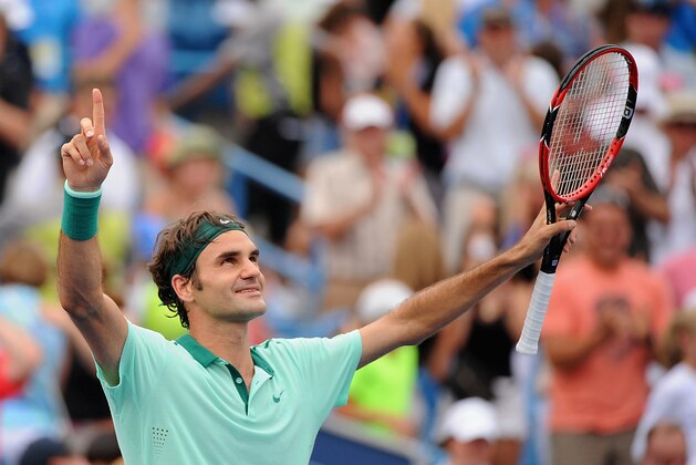 CINCINNATI, OH - AUGUST 17:  Roger Federer of Switzerland celebrates after winning a final match against David Ferrer of Spain on day 9 of the Western & Southern Open at the Linder Family Tennis Center on August 17, 2014 in Cincinnati, Ohio.  (Photo by Jonathan Moore/Getty Images)
