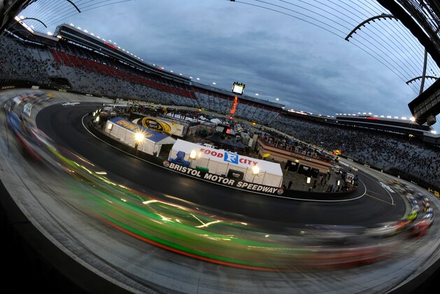 BRISTOL, TN - MARCH 16: Cars go around the track during the NASCAR Sprint Cup Series Food City 500 at Bristol Motor Speedway on March 16, 2014 in Bristol, Tennessee.  (Photo by Jared C. Tilton/Getty Images)
