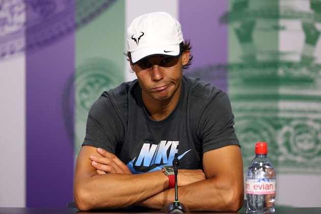 LONDON, ENGLAND - JULY 01:  Rafael Nadal of Spain speaks during a press conference after losing his Gentlemen's Singles fourth round match against Nick Kyrgios of Australia on day eight of the Wimbledon Lawn Tennis Championships at the All England Lawn Tennis and Croquet Club on July 1, 2014 in London, England.  (Photo by Scott Heavey/AELTC - Pool/Getty Images)