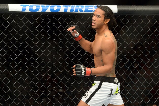Jun 7, 2014; Albuquerque, NM, USA; Benson Henderson (red) enters the ring to fight Rustam Khabilov (blue) in their lightweight bout during UFC Fight Night 42 at Tingley Coliseum. Henderson won via fourth round submission. Mandatory Credit: Joe Camporeale-USA TODAY Sports