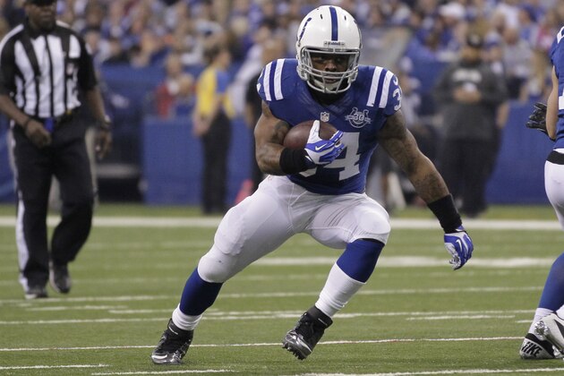 Indianapolis Colts' Trent Richardson (34) runs during the first half of an NFL football game against the Jacksonville Jaguars Sunday, Dec. 29, 2013, in Indianapolis. (AP Photo/AJ Mast)