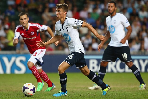 SO KON PO, HONG KONG - JULY 27: Tom Carroll of Tottenhan Hotspur runs with the ball during the Third Place Play-Off match between Tottenham Hotspur and South China at Hong Kong Stadium on July 27, 2013 in So Kon Po, Hong Kong.  (Photo by Robert Cianflone/Getty Images)