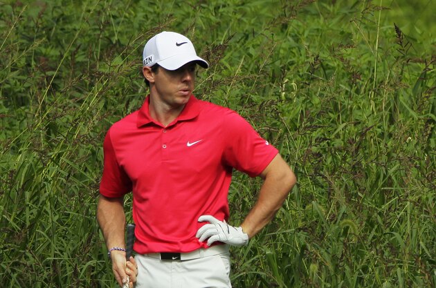 PARAMUS, NJ - AUGUST 21:  Rory McIlroy of Northern Ireland prepares to play his second shot on the 17th hole during the first round of The Barclays at The Ridgewood Country Club on August 21, 2014 in Paramus, New Jersey.  (Photo by Hunter Martin/Getty Images)