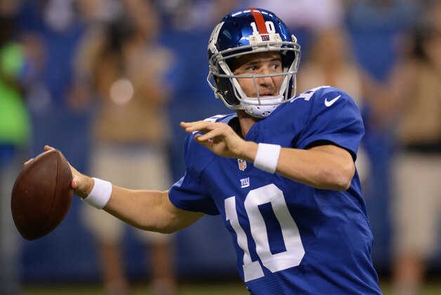 New York Giants quarterback Eli Manning (10) throws during the first half of an NFL preseason football game against the Indianapolis Colts Saturday, Aug. 16, 2014, in Indianapolis. (AP Photo/Chris Howell)