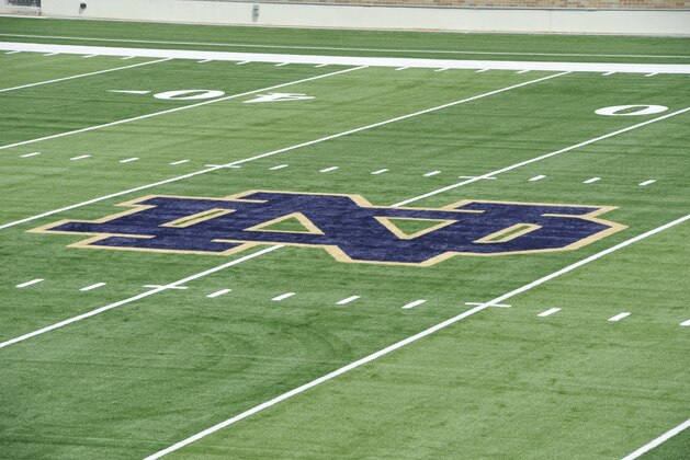 An interlocking ND is located on the 50 yard line shown here after the Installation of field turf is completed at Notre Dame football stadium Tuesday July 30, 2014 in South Bend, Ind. Notre Dame is scheduled to open their season against Rice Saturday Aug. 30, 2014 (AP Photo/Joe Raymond)