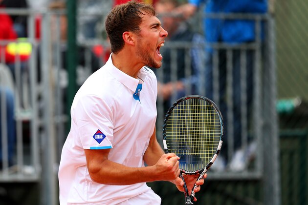 PARIS, FRANCE - MAY 28:  Jerzy Janowicz of Poland celebrates a point in his men's singles match against Jarkko Nieminen of Finland on day four of the French Open at Roland Garros on May 28, 2014 in Paris, France.  (Photo by Clive Brunskill/Getty Images)
