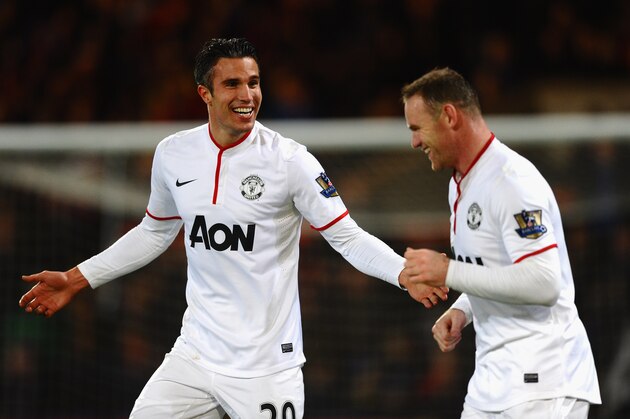 LONDON, ENGLAND - FEBRUARY 22:  Robin Van Persie of Manchester United celebrates the first goal during with Wayne Rooney during the Barclays Premier League match between Crystal Palace and Manchester United at Selhurst Park on February 22, 2014 in London, England.  (Photo by Laurence Griffiths/Getty Images)
