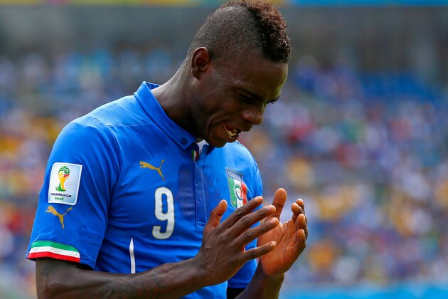 NATAL, BRAZIL - JUNE 24:  Mario Balotelli of Italy reacts during the 2014 FIFA World Cup Brazil Group D match between Italy and Uruguay at Estadio das Dunas on June 24, 2014 in Natal, Brazil.  (Photo by Clive Rose/Getty Images)