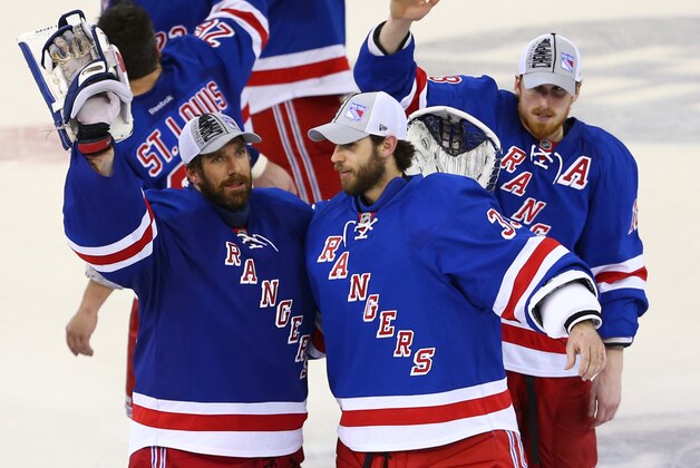 NEW YORK, NY - MAY 29:  Henrik Lundqvist #30 and Cam Talbot #33 of the New York Rangers celebrates after defeating the Montreal Canadiens in Game Six to win the Eastern Conference Final in the 2014 NHL Stanley Cup Playoffs at Madison Square Garden on May 29, 2014 in New York City.Rangers defeated the Candiens 1-0.  (Photo by Elsa/Getty Images)