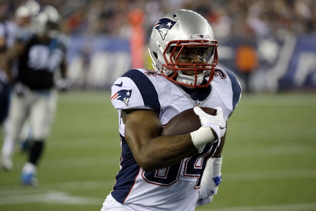 New England Patriots running back Shane Vereen runs to the goal line for a touchdown after catching a pass from Tom Brady in the first half of an NFL preseason football game against the Carolina Panthers Friday, Aug. 22, 2014, in Foxborough, Mass. (AP Photo/Stephan Savoia)