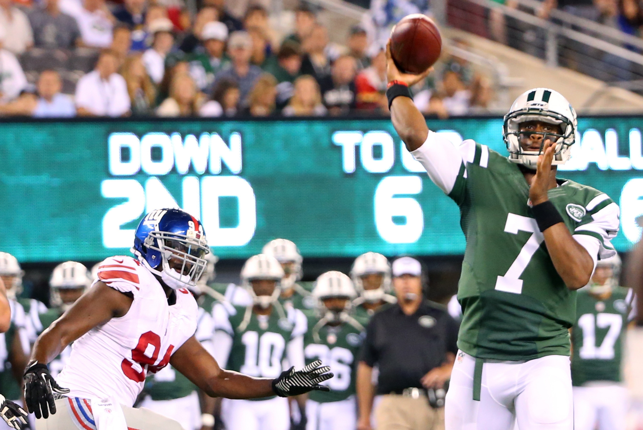 Aug 22, 2014; East Rutherford, NJ, USA;  New York Jets quarterback Geno Smith (7) passes during the second quarter against the New York Giants at MetLife Stadium. Mandatory Credit: Anthony Gruppuso-USA TODAY Sports